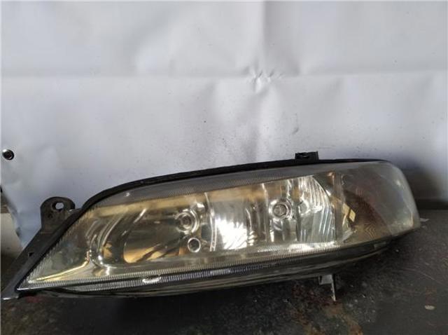 Reflektor lewy 90586844 OPEL