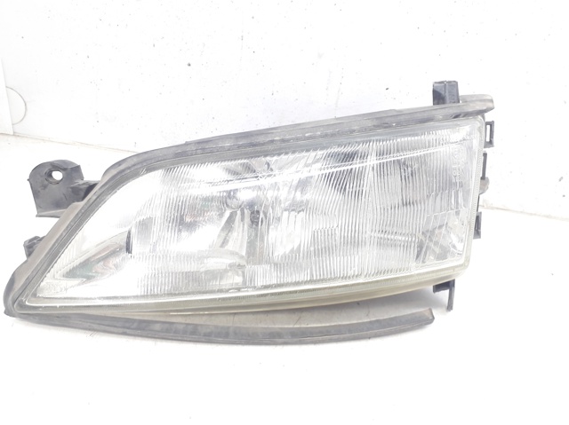 Reflektor lewy 9119523 OPEL