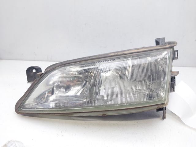 Reflektor lewy 9119523 OPEL