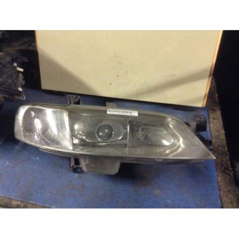 Reflektor prawy 9193244 OPEL