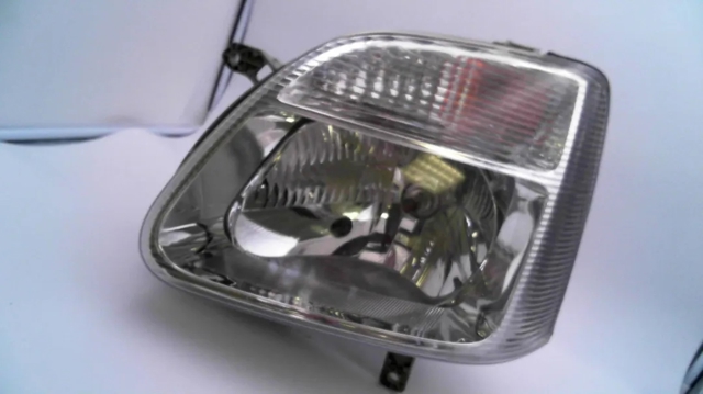 Reflektor lewy 9199350 OPEL