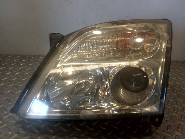 Reflektor lewy 93171428 OPEL