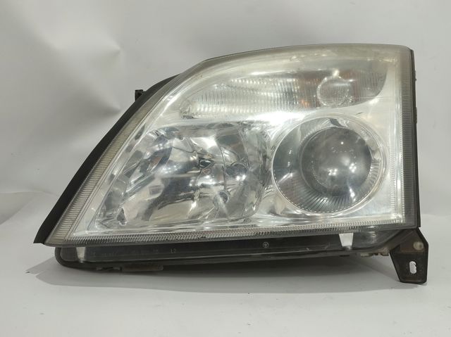 Reflektor lewy 93171428 OPEL