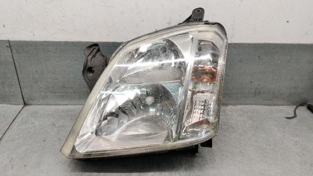 Reflektor lewy 93175364 OPEL