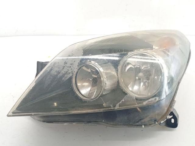 Reflektor lewy 93178635 OPEL