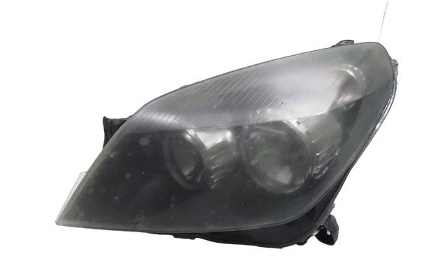 Reflektor lewy 93178635 OPEL