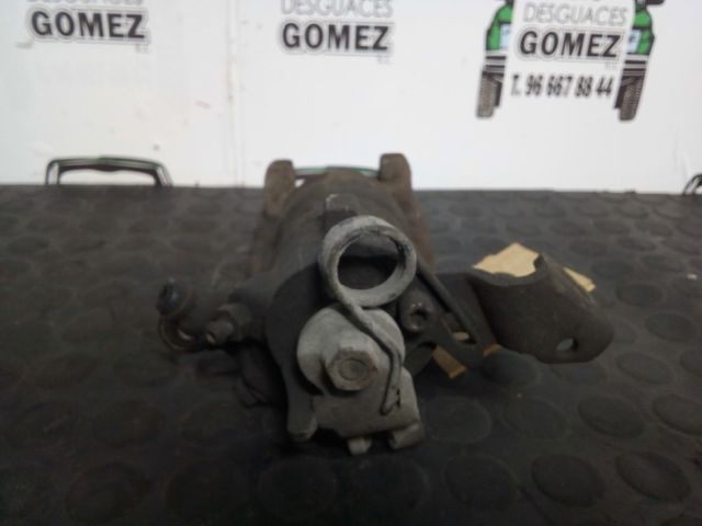 Zacisk hamulcowy tylny lewy 93179158 OPEL