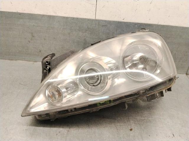 Reflektor lewy 93188581 OPEL