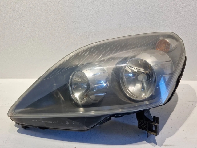 Reflektor lewy 93190408 OPEL