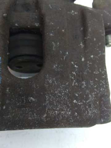 Zacisk hamulcowy tylny lewy 93190673 OPEL