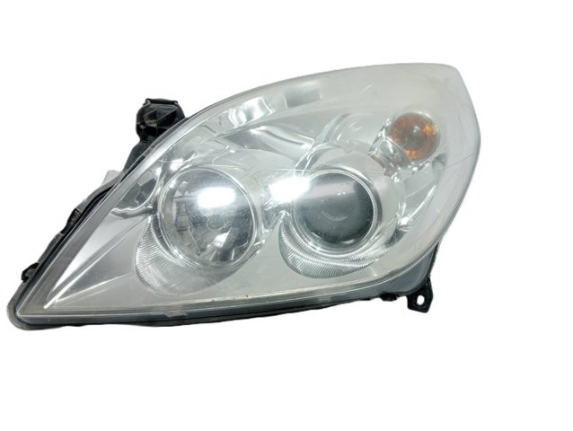 Reflektor lewy 93192377 OPEL