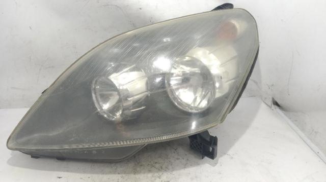Reflektor lewy 93192443 OPEL