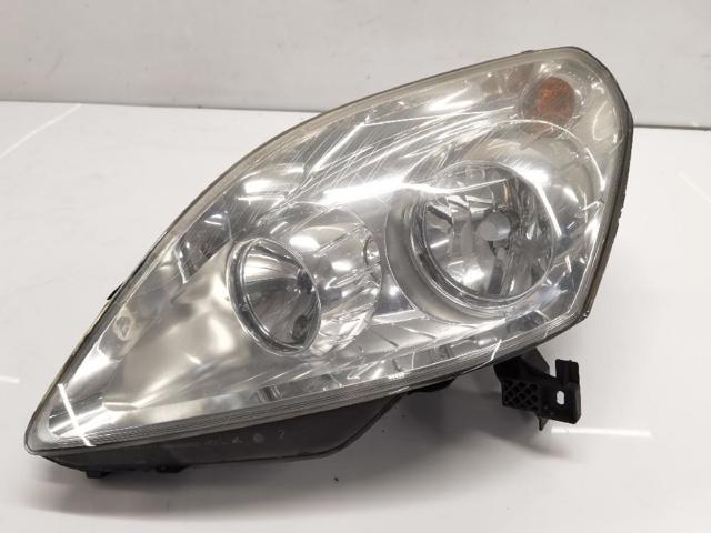 Reflektor lewy 93192443 OPEL
