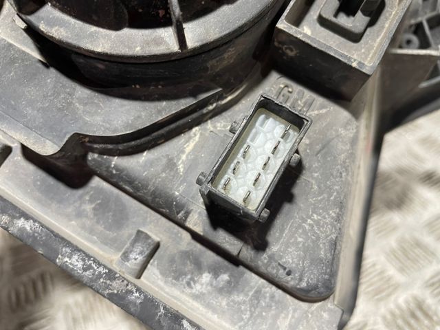 Reflektor lewy 93321052 OPEL