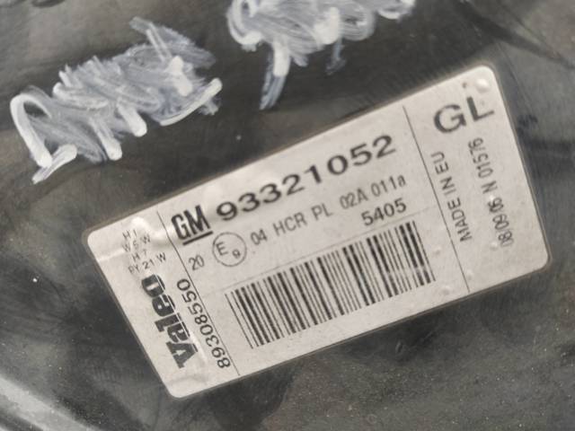 Reflektor lewy 93321052 OPEL