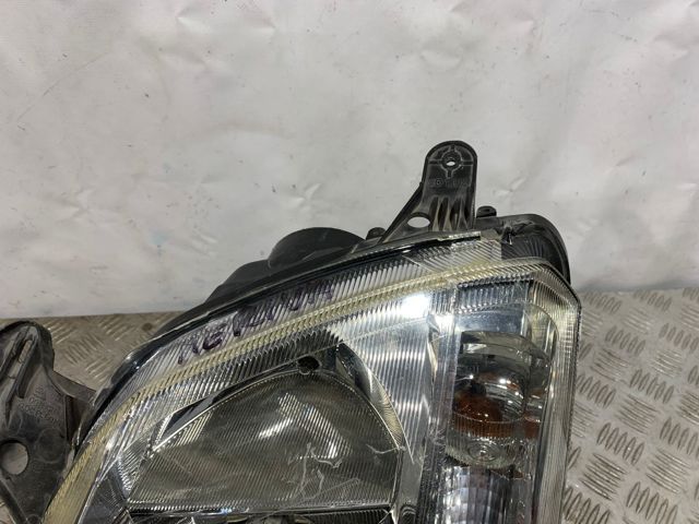 Reflektor lewy 93321052 OPEL