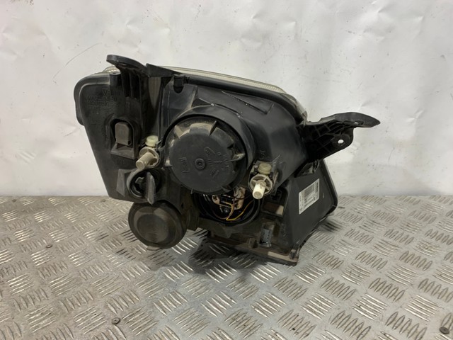 Reflektor lewy 93321052 OPEL