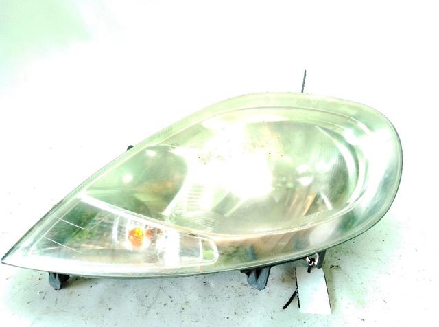 Reflektor lewy 93864870 OPEL