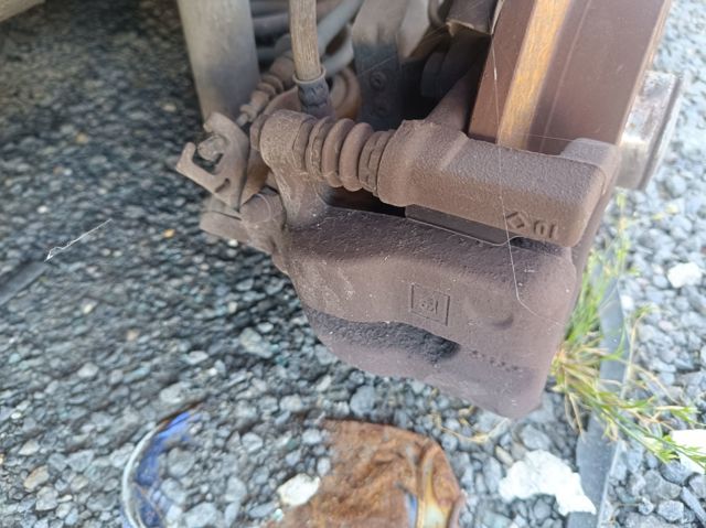 Zacisk hamulcowy tylny prawy 95517075 OPEL