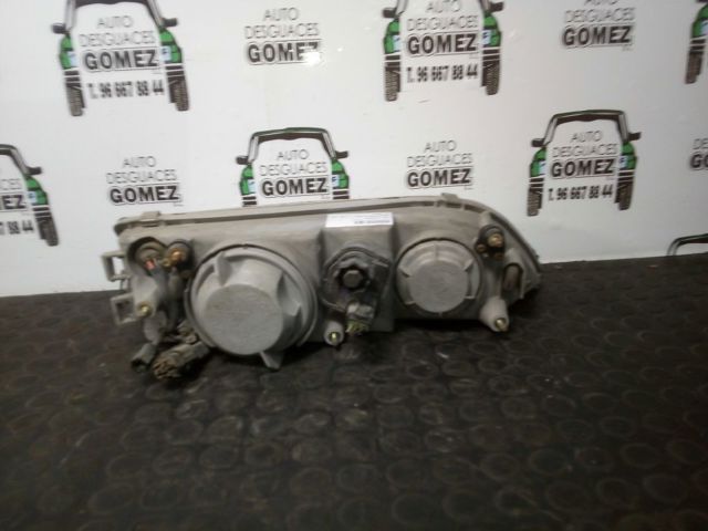 Reflektor lewy Daewoo Espero KLEJ