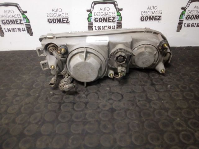 Reflektor lewy Daewoo Espero KLEJ