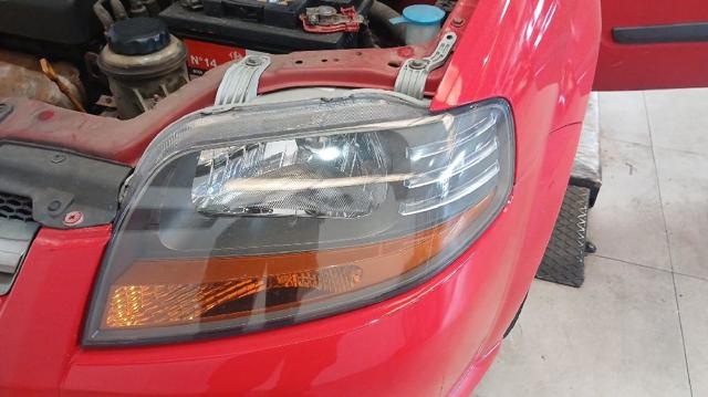 Reflektor lewy 96408154 GM
