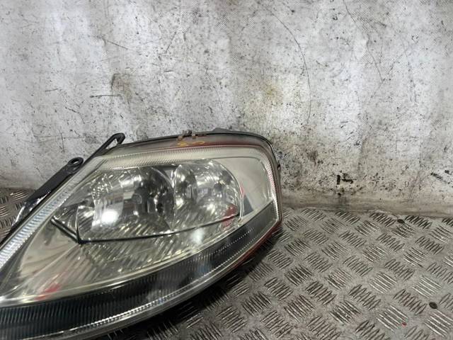 Reflektor lewy 9647214280 PEUGEOT