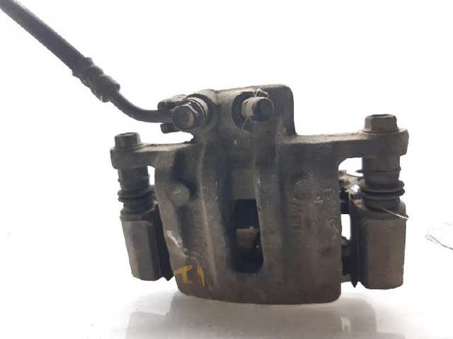 Zacisk hamulcowy tylny lewy 96626073 OPEL