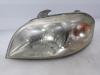 Reflektor lewy 96650521 GM