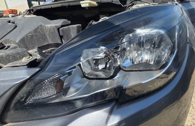 Reflektor lewy 9677523080 PEUGEOT