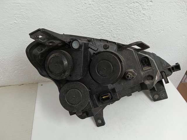 Reflektor lewy 9806306180 PEUGEOT