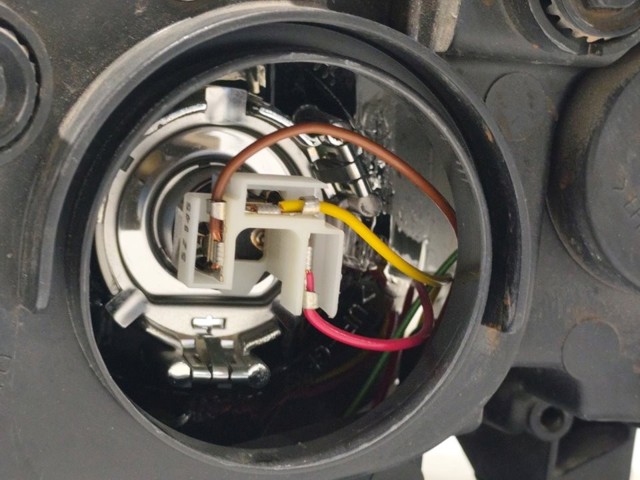 Reflektor prawy 9S5113005BA FORD