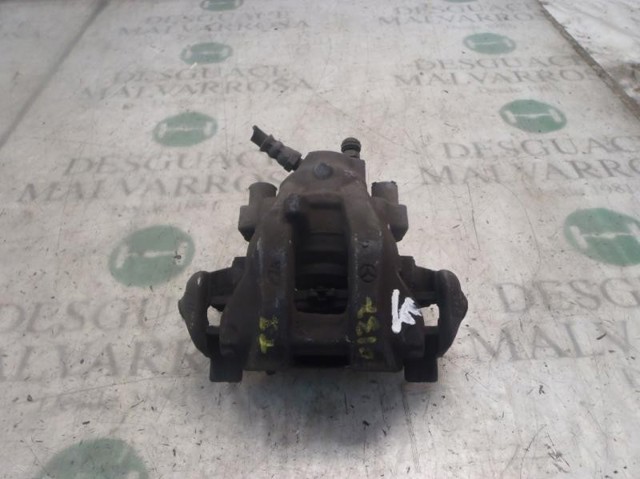 Zacisk hamulcowy tylny lewy A0024202583 MERCEDES