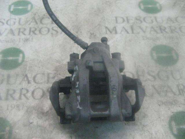 Zacisk hamulcowy tylny lewy A0024202783 MERCEDES