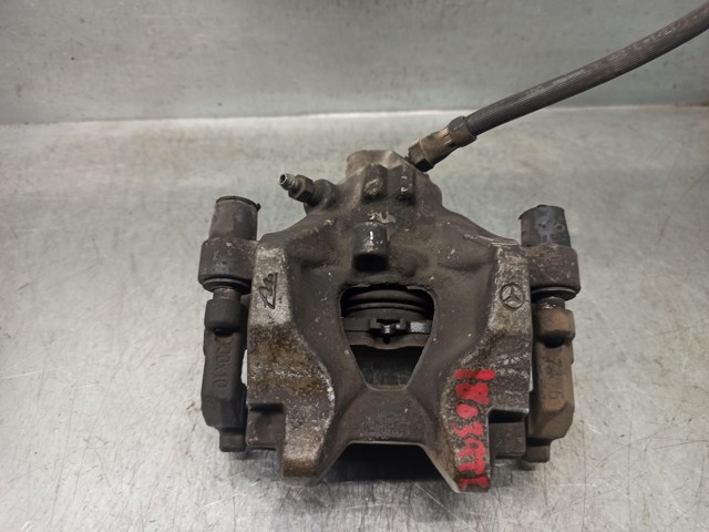 Zacisk hamulcowy tylny lewy A2044231581 MERCEDES