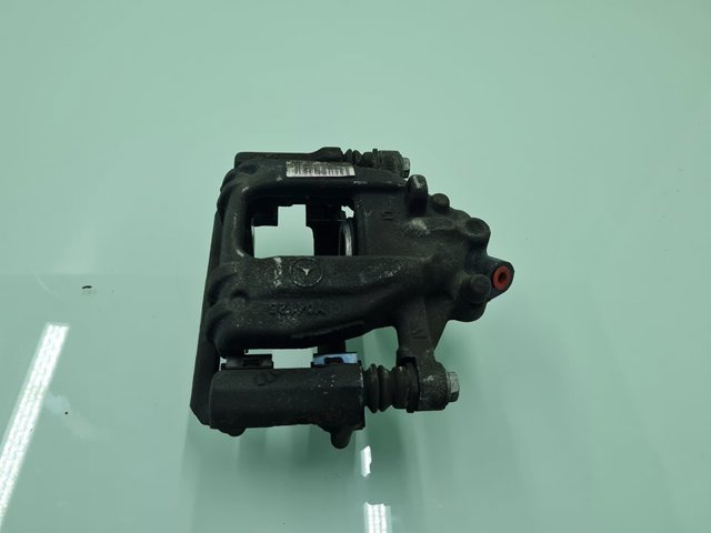 Zacisk hamulcowy tylny lewy A9064231398 MERCEDES