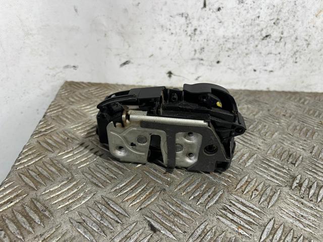 Zamek drzwi przednich lewych AM5AU21813AE FORD