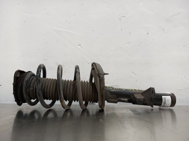 Amortyzator przedni lewy AV6118K001ABE FORD