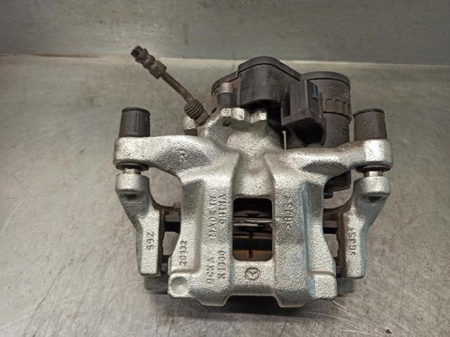 Zacisk hamulcowy tylny prawy B4Y72698ZC MAZDA