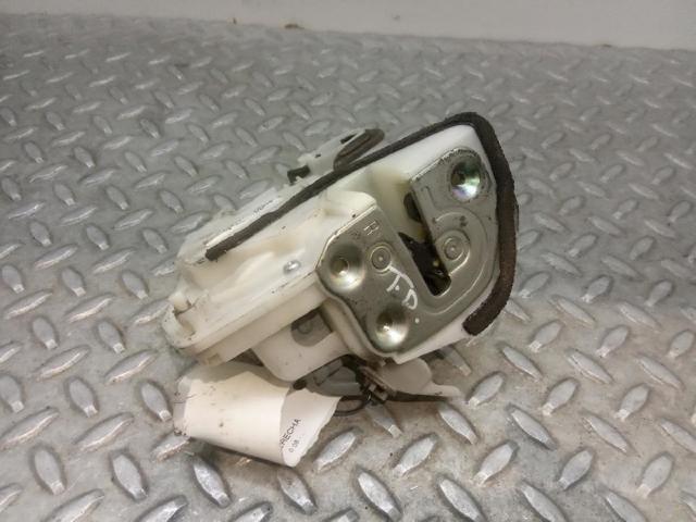 Zamek drzwi tylnych prawych BBM472310A MAZDA