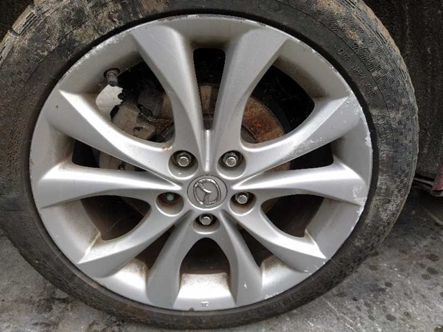 Zamek drzwi tylnych lewych Mazda 3 BL