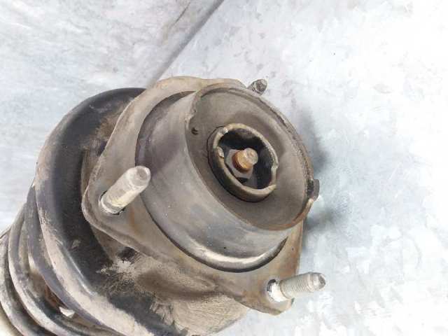 Amortyzator przedni lewy Mazda 323 BA