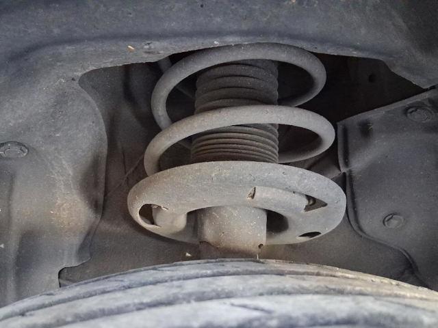 Amortyzator przedni lewy BHS234900A MAZDA