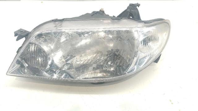 Reflektory Mazda 323
