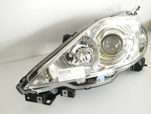 Reflektor lewy C23551040 MAZDA