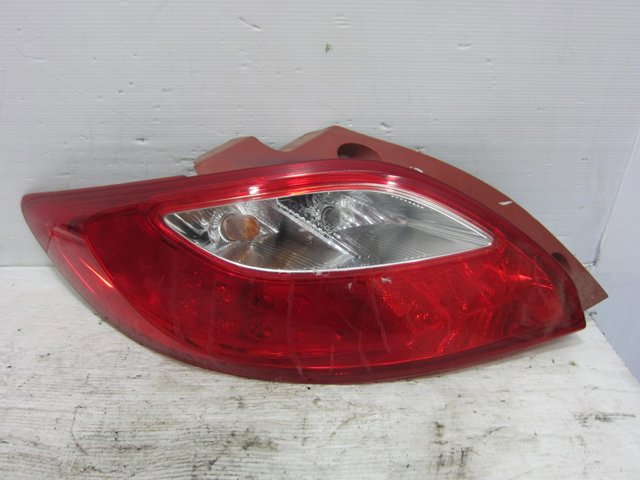 Lampa zespolona tylna lewa D65151160 MAZDA