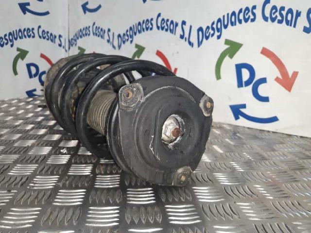 Amortyzator przedni prawy E4302JG71A NISSAN