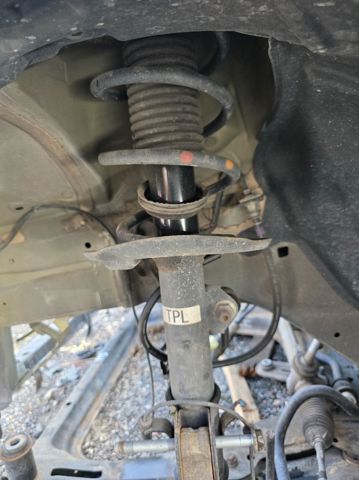 Amortyzator przedni lewy E4303BA61A NISSAN
