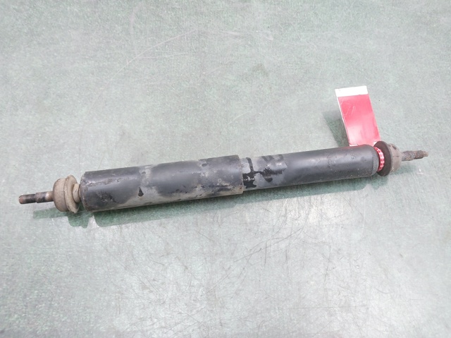 Amortyzator przedni E6110VB026 NISSAN
