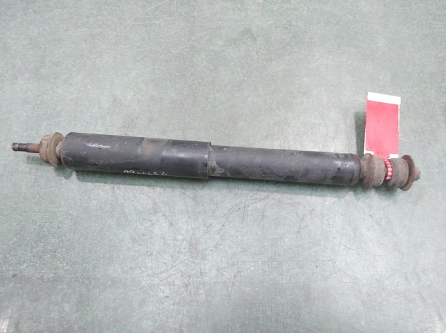 Amortyzator przedni E6110VB026 NISSAN
